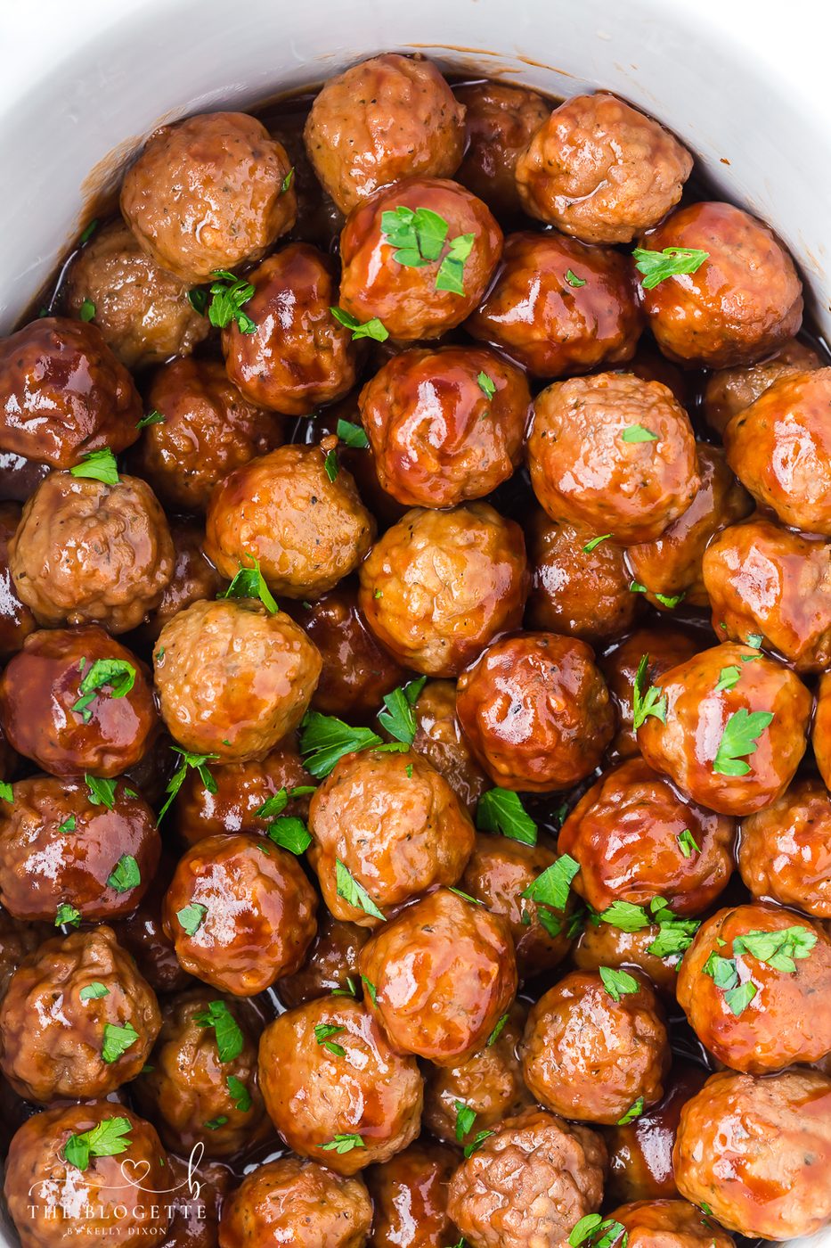 Speedy and straightforward Honey BBQ Crockpot Meatballs - simple ingredients in a slow cooker, the slow-cooker does all the work.