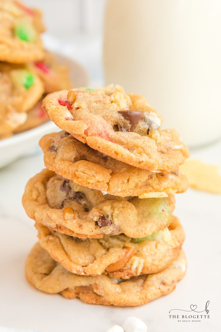 Kitchen Sink Christmas Cookies are sweet-and-salty, chewy-and-soft-centered cookies with M&M's, chocolate chips, pretzels, marshmallows, potato chips... everything but the kitchen sink!