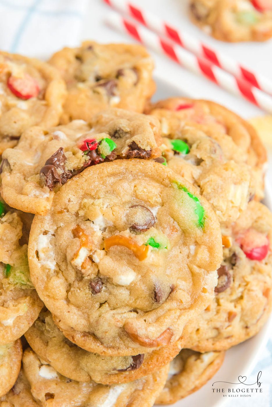 Kitchen Sink Christmas Cookies are sweet-and-salty, chewy-and-soft-centered cookies with M&M's, chocolate chips, pretzels, marshmallows, potato chips... everything but the kitchen sink!