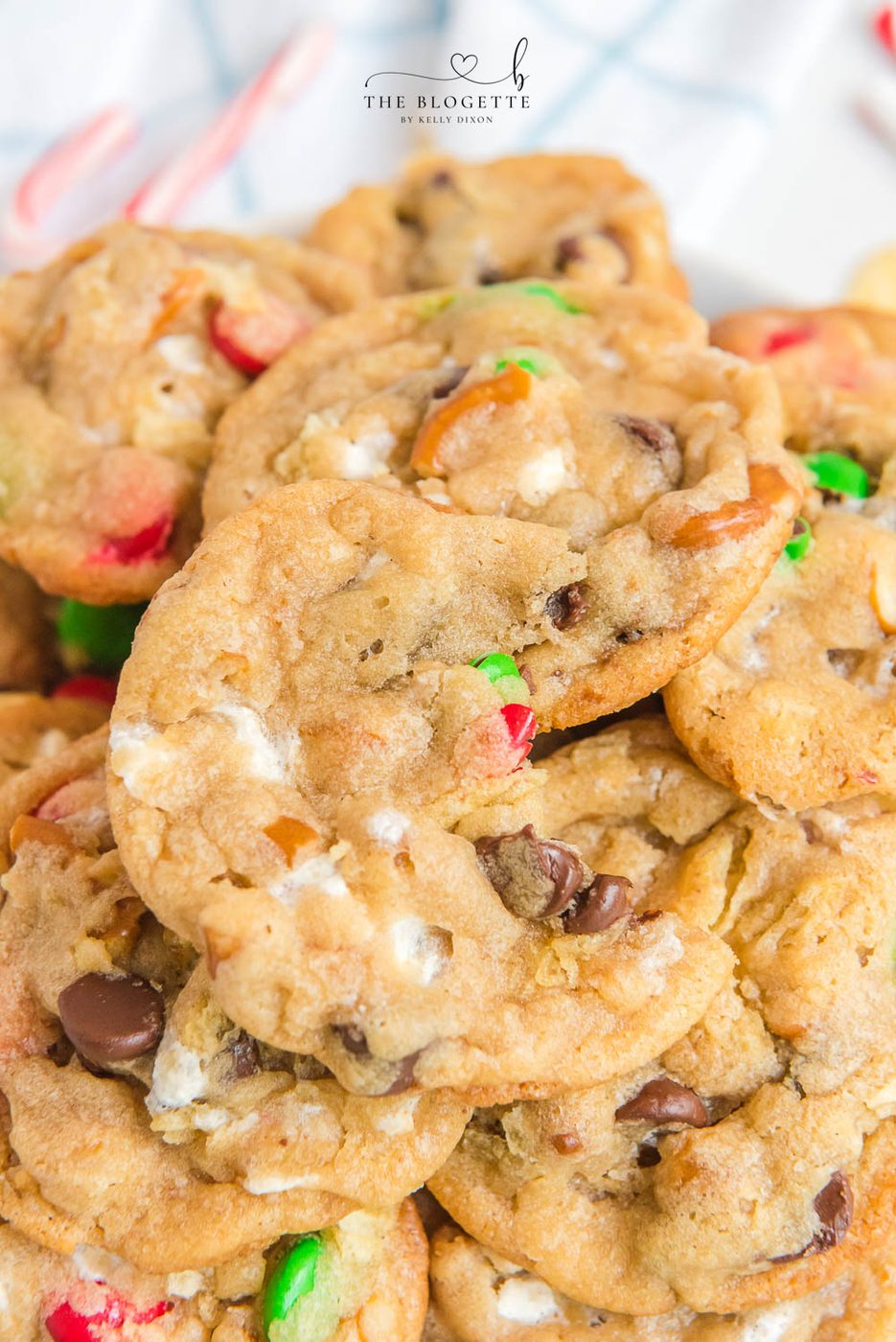 Kitchen Sink Christmas Cookies are sweet-and-salty, chewy-and-soft-centered cookies with M&M's, chocolate chips, pretzels, marshmallows, potato chips... everything but the kitchen sink!