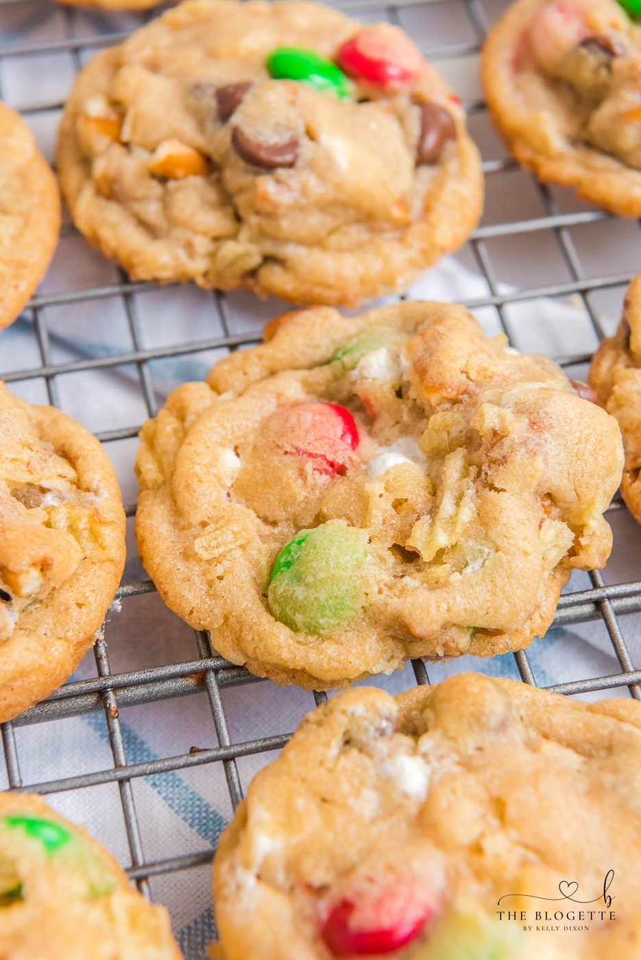 Kitchen Sink Christmas Cookies are sweet-and-salty, chewy-and-soft-centered cookies with M&M's, chocolate chips, pretzels, marshmallows, potato chips... everything but the kitchen sink!