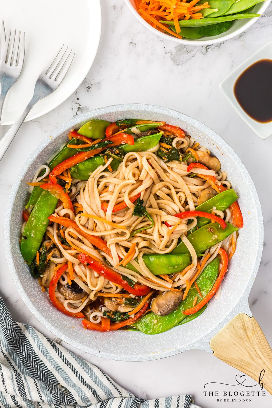 Add the noodles to the vegetables