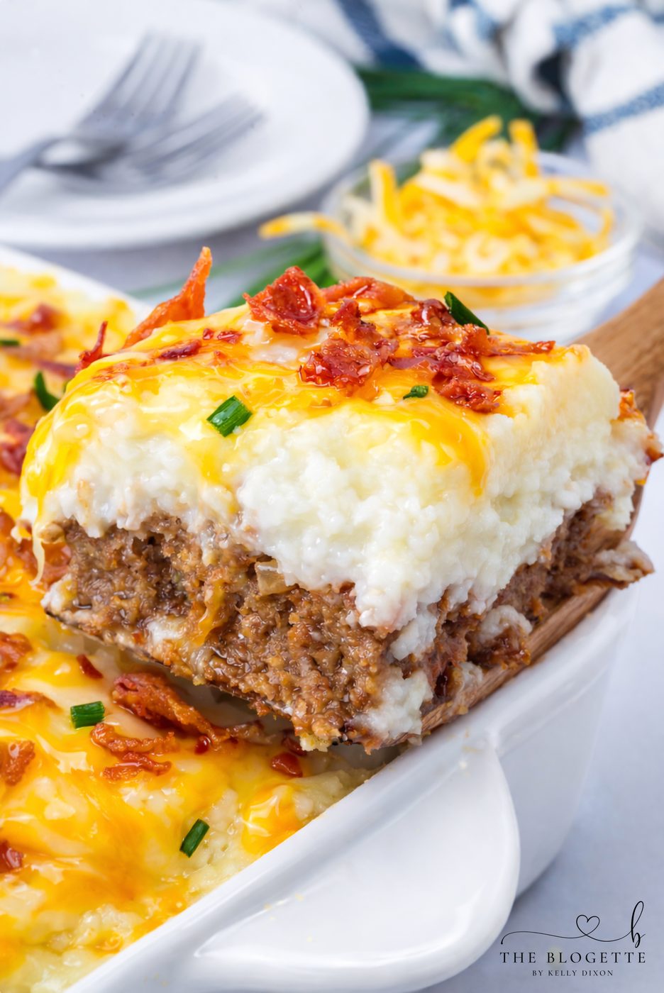 This Loaded Potato Meatloaf Casserole is the ultimate comfort food dinner. Layers of juicy meatloaf, creamy mashed potatoes, melted cheese, and crispy bacon make this straightforward casserole well-balanced for family dinners, meal prep, and freezer meals.