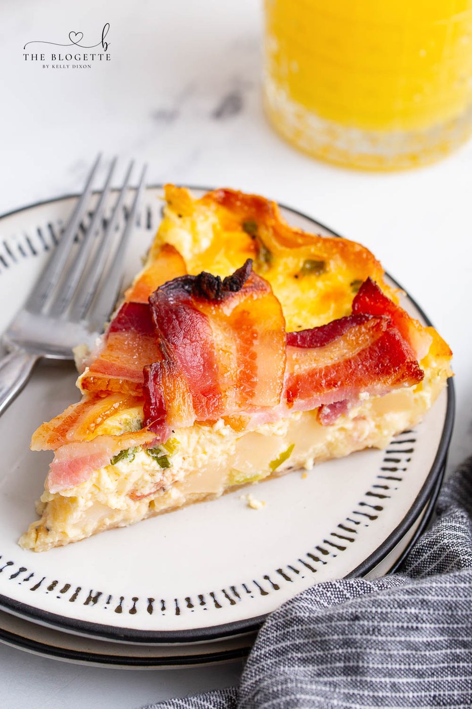 Maple Bacon Breakfast Pie has all of your favorite ingredients - eggs, bacon, cheese, and potatoes, all baked in a pie crust!