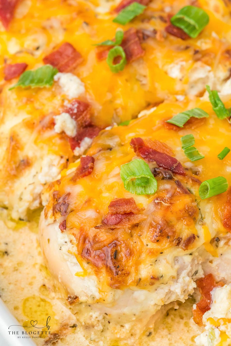 This Million Dollar Chicken recipe is straightforward, cheesy, and smothered in a special cream sauce, then topped with bacon!