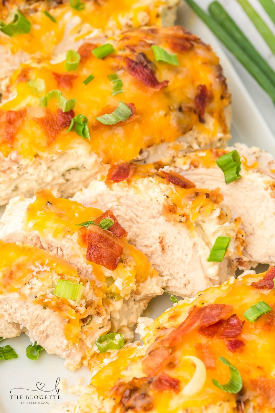 This Million Dollar Chicken recipe is straightforward, cheesy, and smothered in a special cream sauce, then topped with bacon!