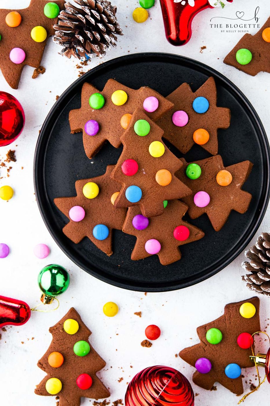 These creative, adorable, and fun cookies with M&M lights are straightforward to mix. M&M Christmas Tree Cookies are a kid's favorite to make and are a great treat when you are with friends, family, or company.