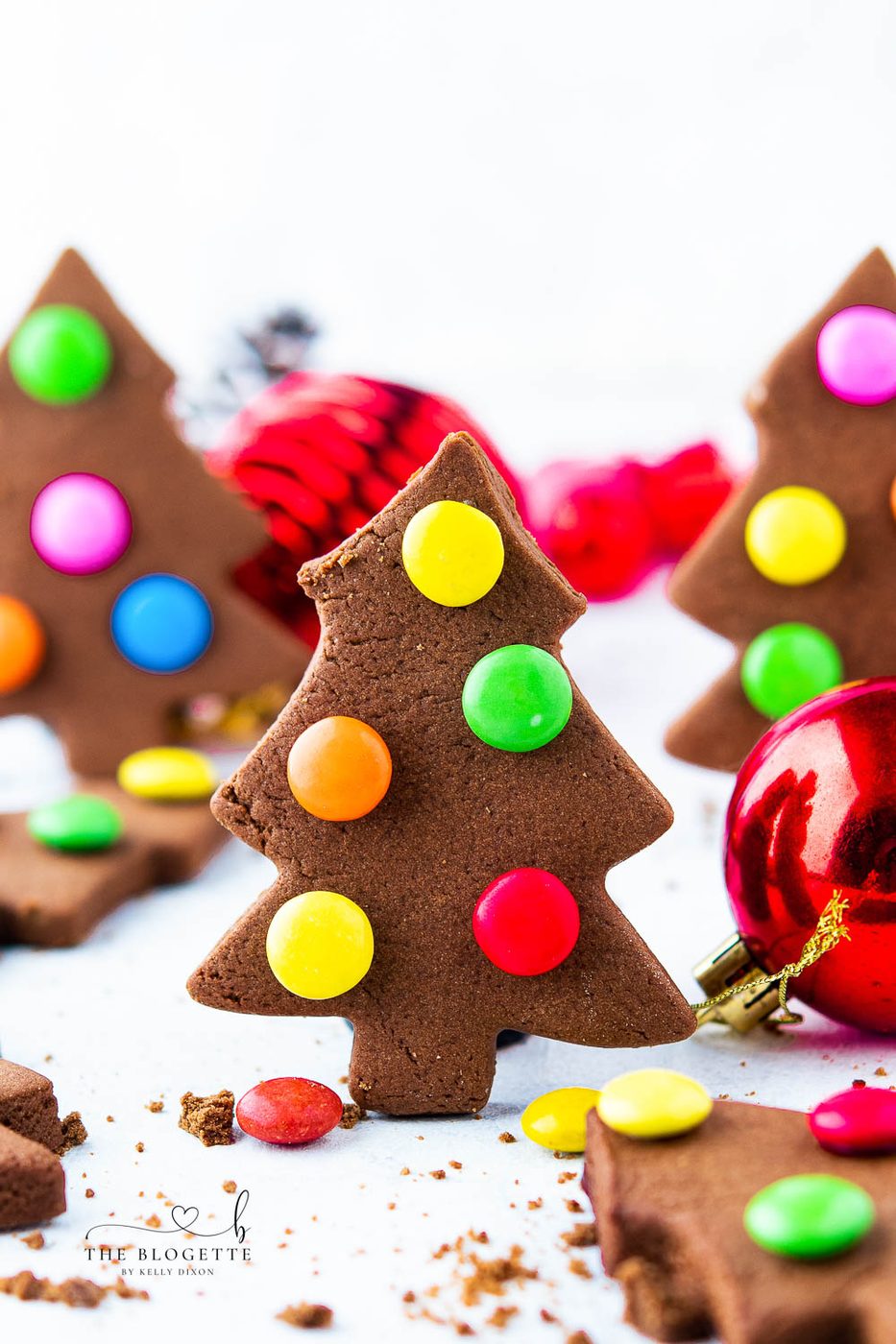 These creative, adorable, and fun cookies with M&M lights are straightforward to mix. M&M Christmas Tree Cookies are a kid's favorite to make and are a great treat when you are with friends, family, or company.