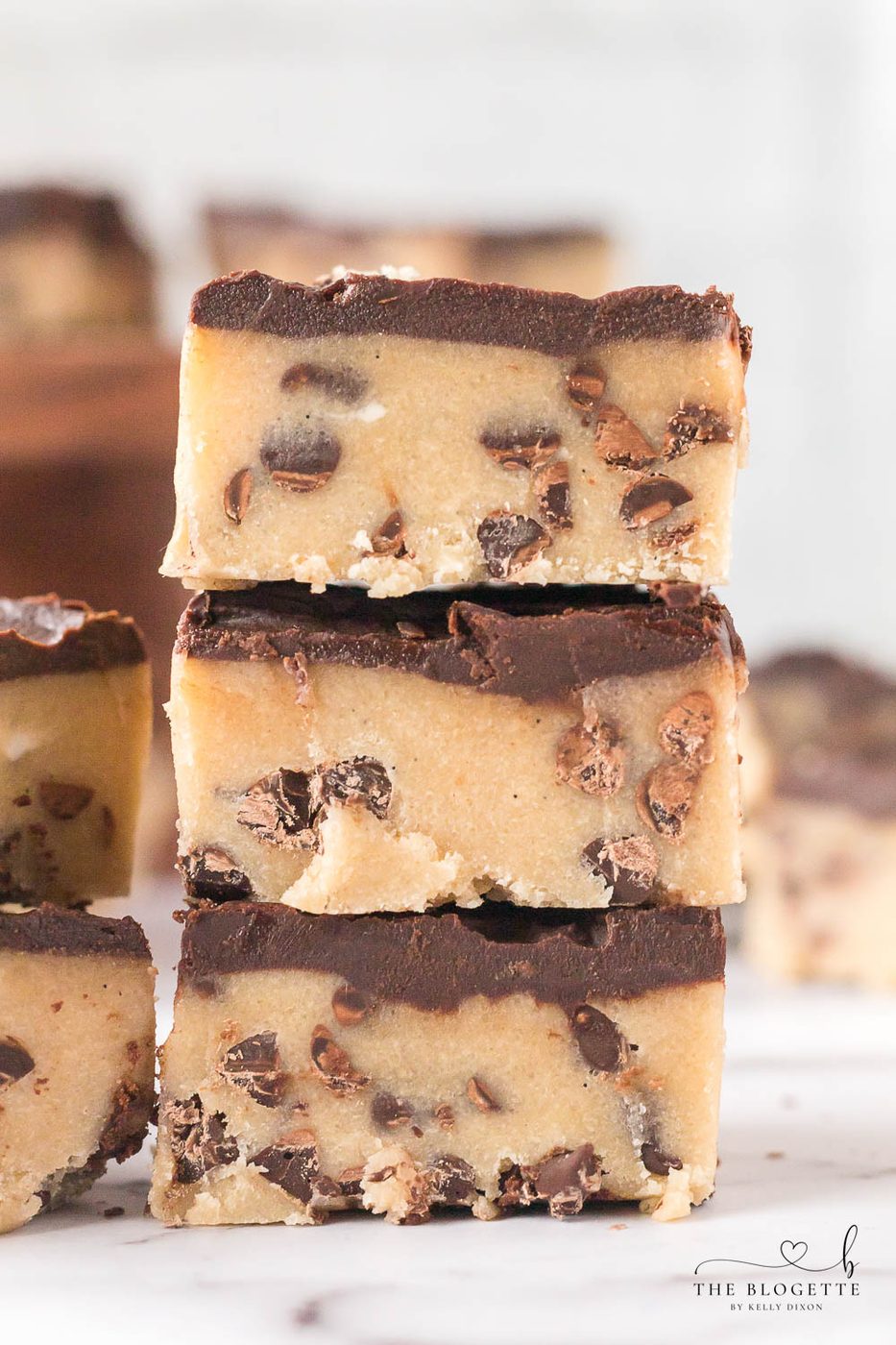 No-Bake Chocolate Chip Cookie Bars are irresistible, fun to make, and safe to eat! Simply put the bars in the refrigerator, chill, and enjoy!