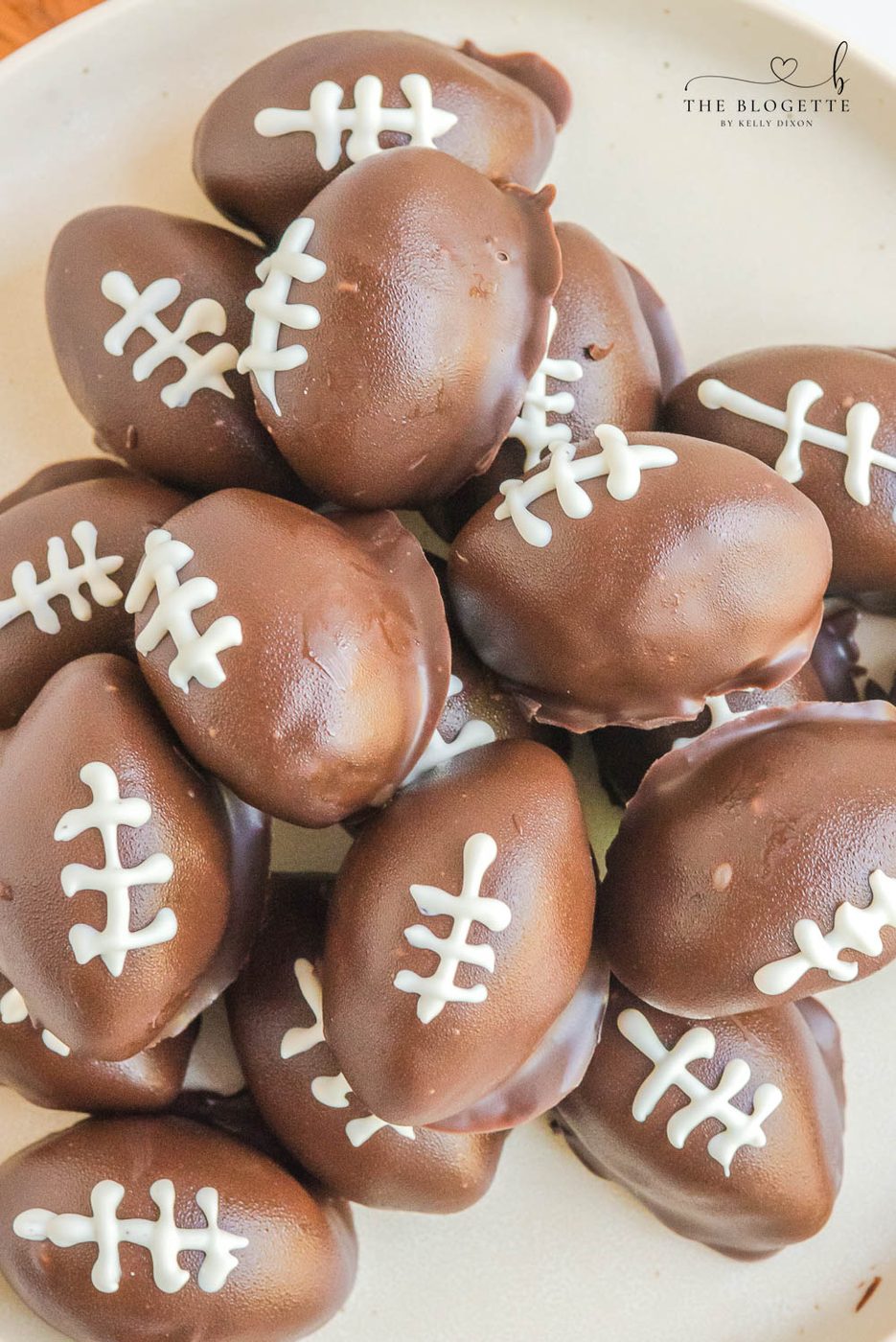 Oreo Football Truffles are well-balanced for the Bowl, Tailgating Parties, or even just to snack on during the game! Only 5 ingredients!