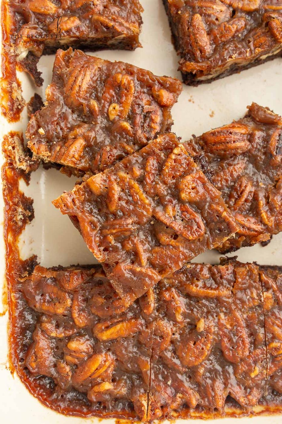 Pecan Pie Brownies are fudgy chocolate brownies topped with a pecan pie filling for an irresistible dessert. This is a Thanksgiving FAVORITE but is satisfying all year long.