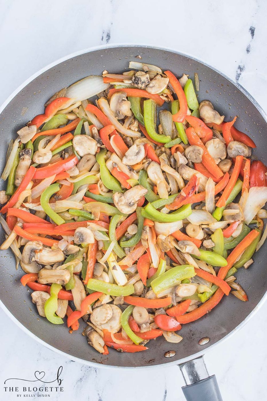 Cheesesteak with sautéed vegetables