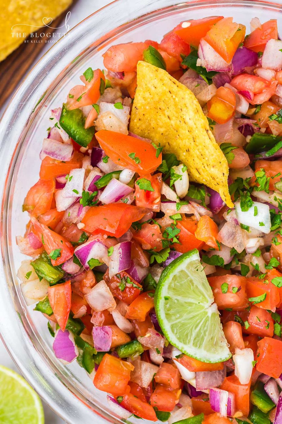 From-scratch Pico de Gallo is so fresh and straightforward to mix! Featuring fresh tomatoes, jalapeños, onions, cilantro, and more.