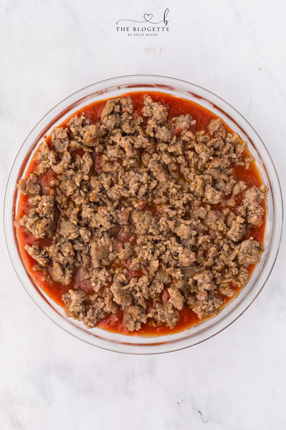Add the sauce and sausage