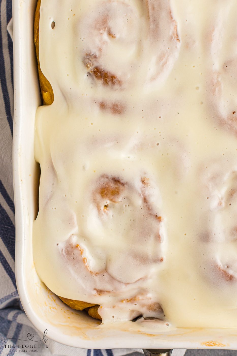 Fluffy Pumpkin Cinnamon Rolls topped with an addicting from-scratch glaze and filled with a buttery pumpkin spice sugar blend.