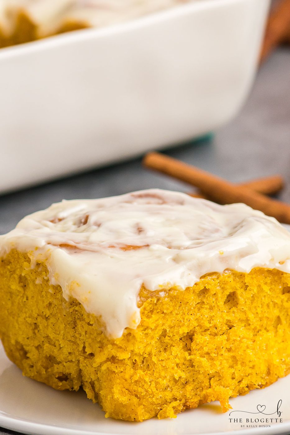 Fluffy Pumpkin Cinnamon Rolls topped with an addicting from-scratch glaze and filled with a buttery pumpkin spice sugar blend.