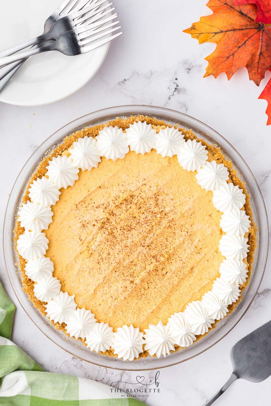Pumpkin Fluff Pie is a pumpkin cream pie with a graham cracker crust. If you're craving a cold and creamy pumpkin spice treat, this one is for you!