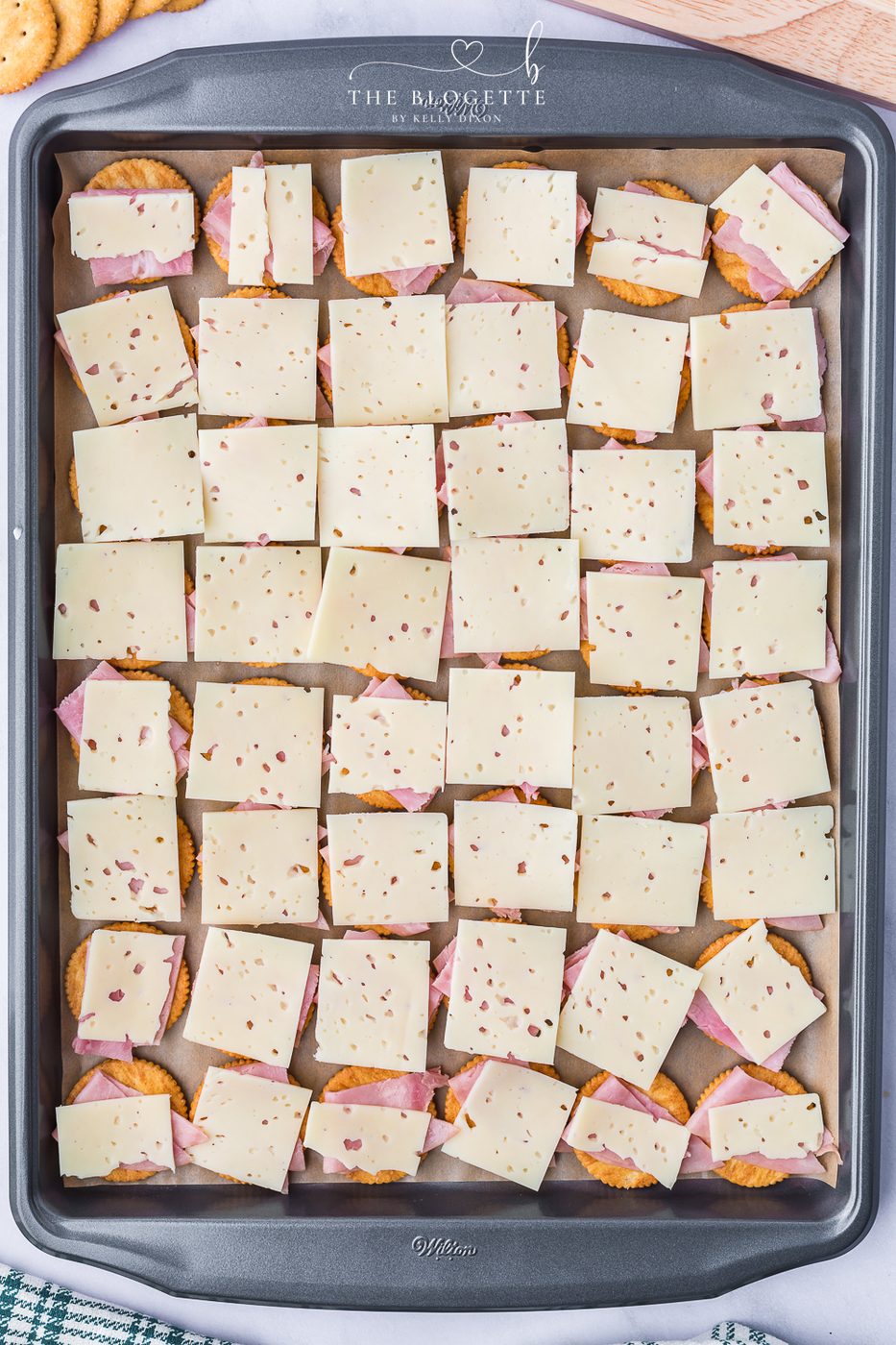 Layer the ham and cheese