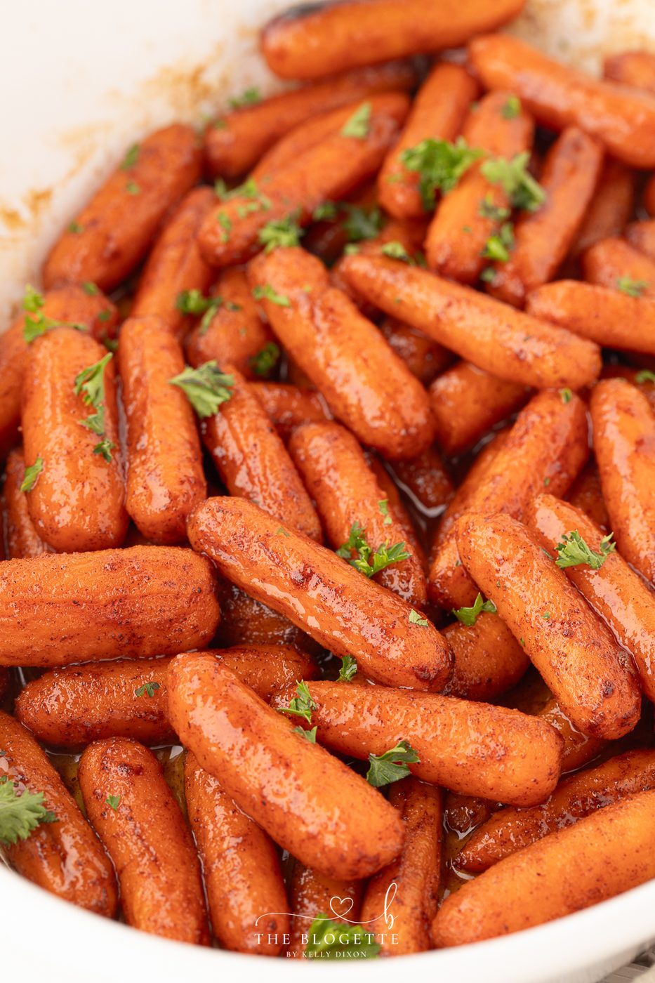 Roasted Baby Carrots are sweet, tender, and done in 30 minutes! A must-have during the holidays, but great for any weeknight dinner!