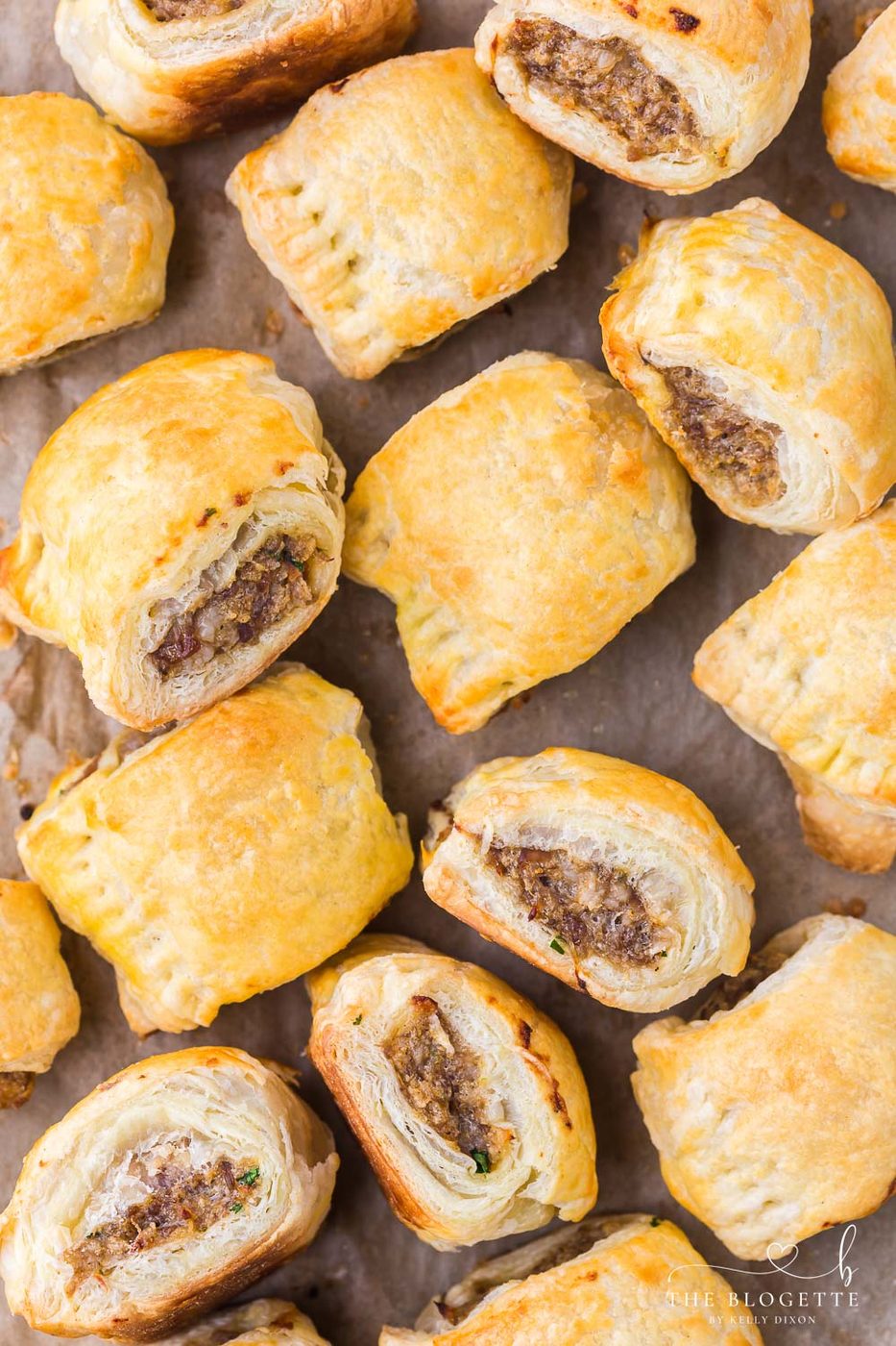 Appetizer sausage rolls feature a meaty mixture stuffed inside buttery soft puff pastry. An straightforward crowd-pleasing handheld party appetizer!