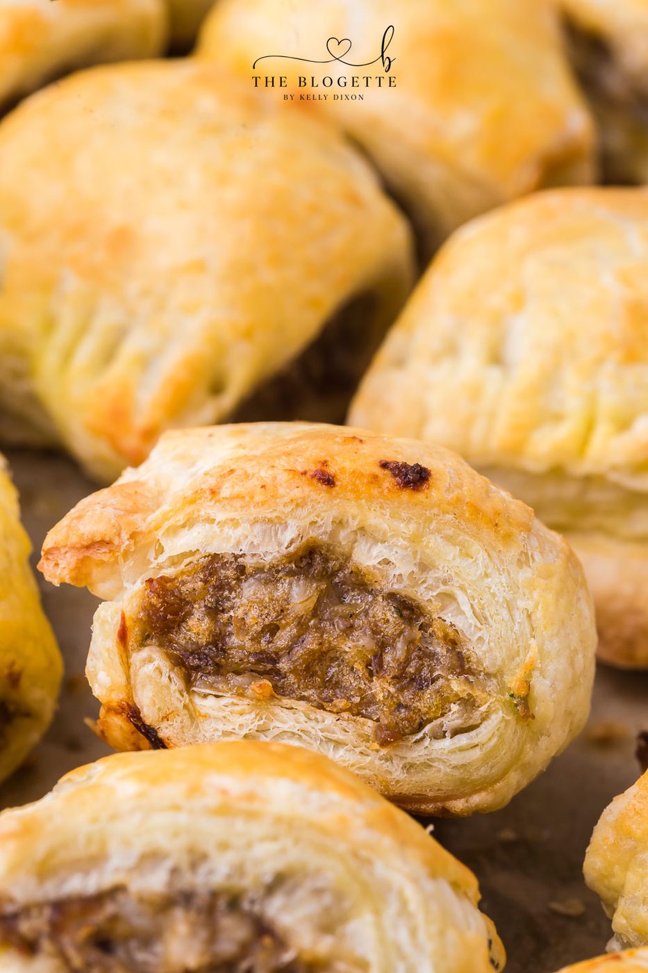 Appetizer sausage rolls feature a meaty mixture stuffed inside buttery soft puff pastry. An straightforward crowd-pleasing handheld party appetizer!