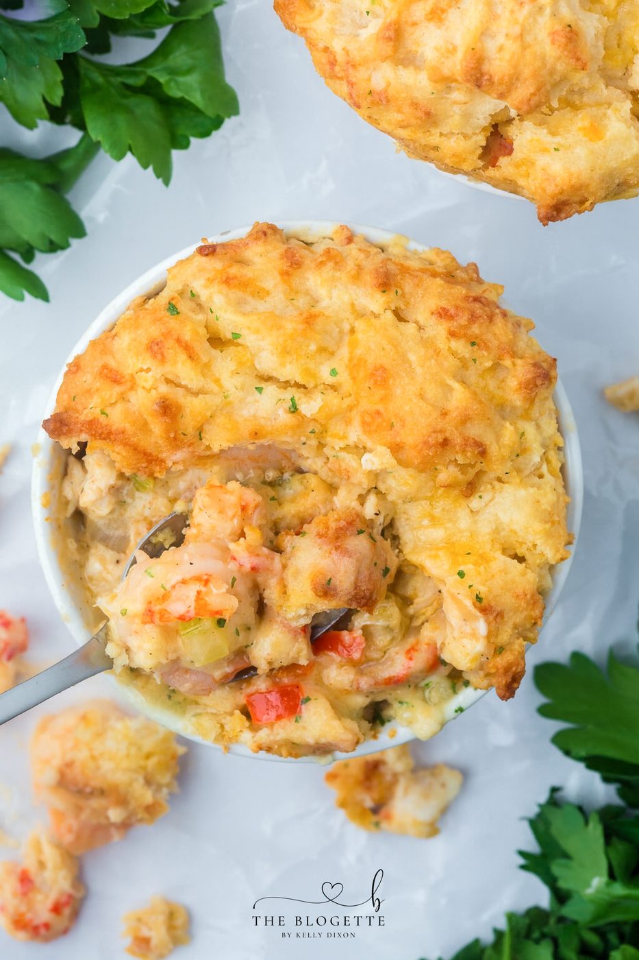 Seafood Pot Pie is the ultimate comfort food with a coastal twist. Loaded with shrimp, lobster, and crab covered in a buttery golden crust.