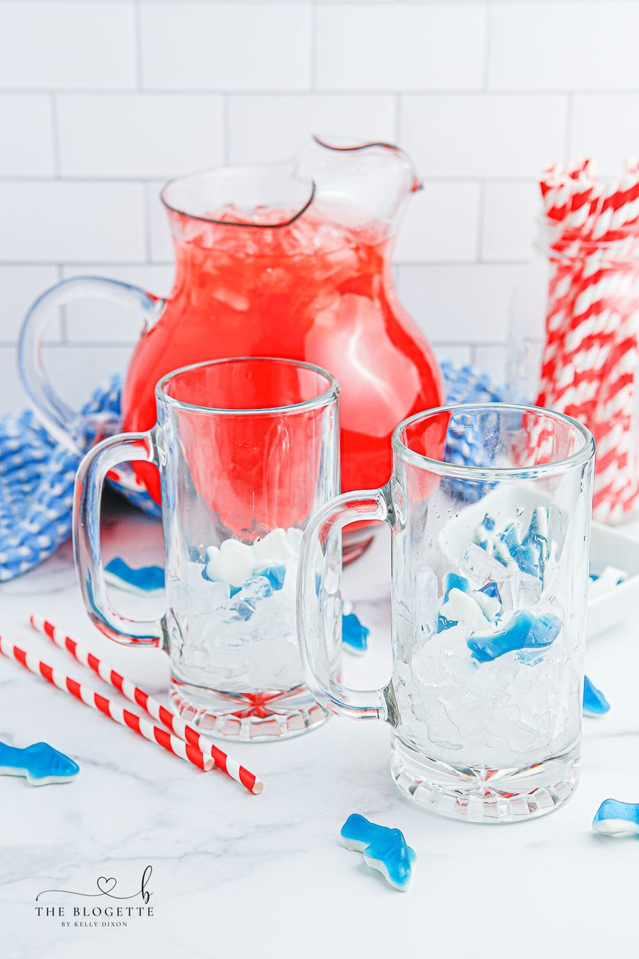 Shark gummies in a cup with ice
