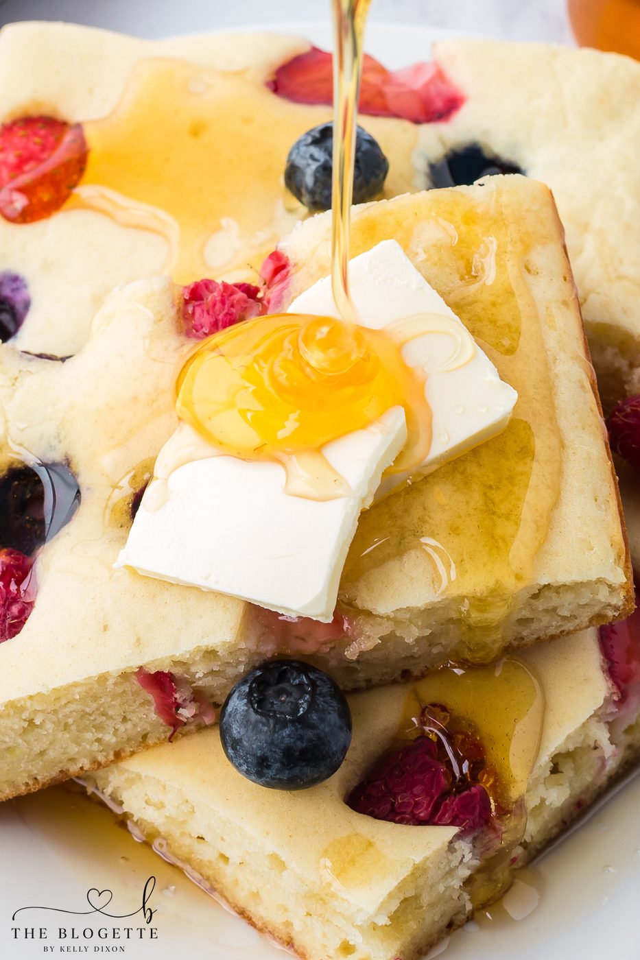 Sheet Pan Pancakes are the world's easiest pancakes! A great take-along breakfast for kids and they are freeze-ahead friendly!
