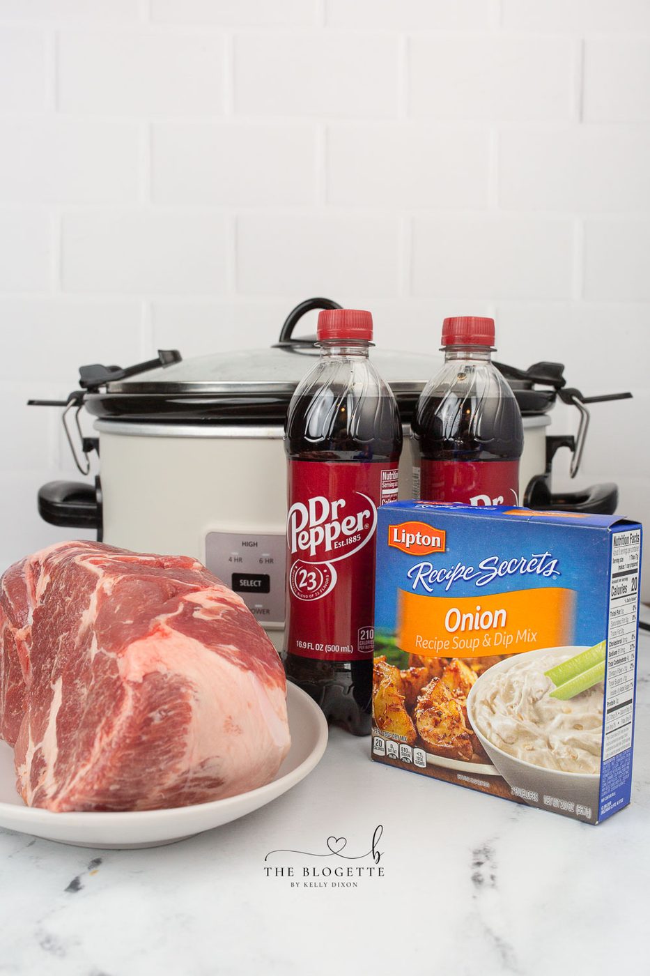 Dr. Pepper Pulled Pork made in a slow cooker is straightforward, tender, and satisfying. Everything you love about sweet and savory pulled pork, but when it's flavored with Dr. Pepper, it makes every single bite melt in your mouth!