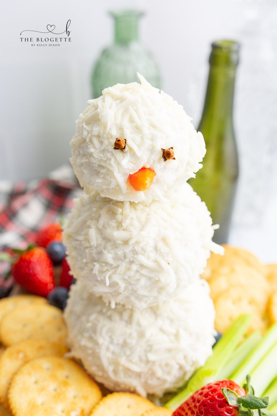 An adorable Snowman Cheeseball is what every winter gathering needs! This is simply the cutest winter appetizer that everyone will love.