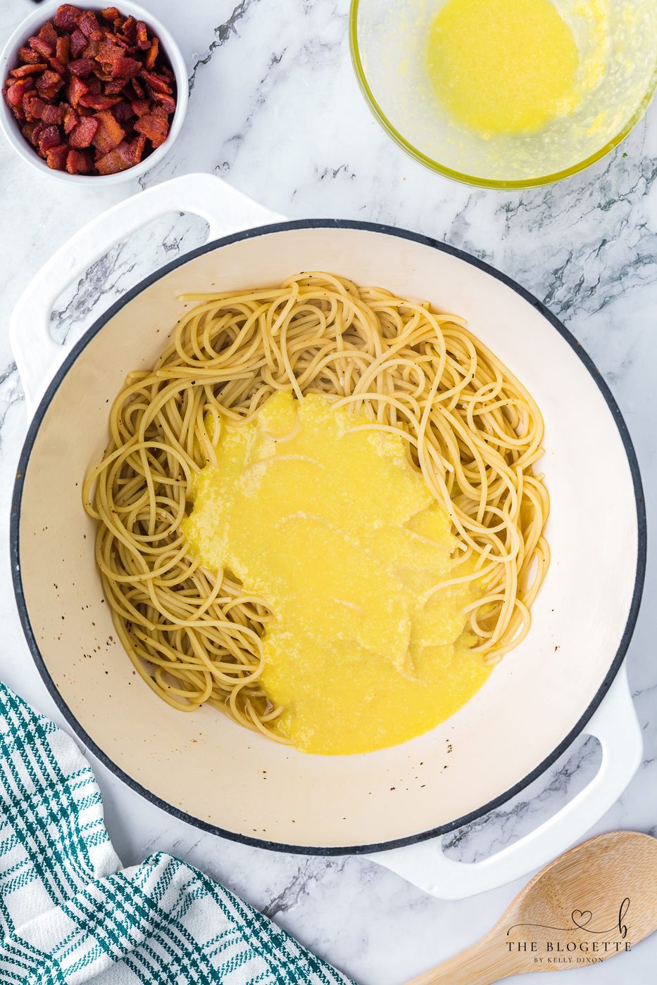 Add egg mixture to the spaghetti