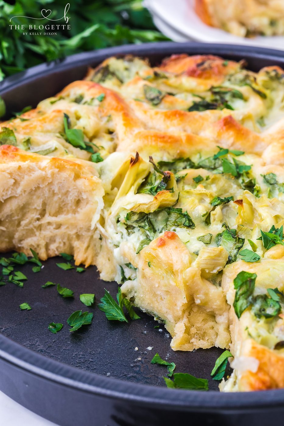 Cheesy Spinach Artichoke Pinwheels are pastry-stuffed rolls baked to perfection. A wonderful appetizer is well-balanced for game day or any event!