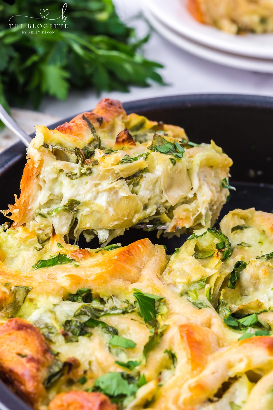 Cheesy Spinach Artichoke Pinwheels are pastry-stuffed rolls baked to perfection. A wonderful appetizer is well-balanced for game day or any event!