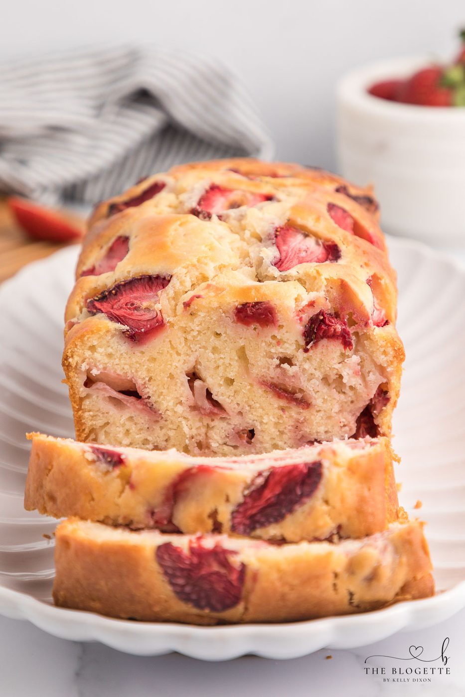 Sweet and soft Strawberry Bread is a spring and summer staple treat! Made with fresh strawberries, this speedy bread recipe is the well-balanced way to enjoy strawberries while they're in season.
