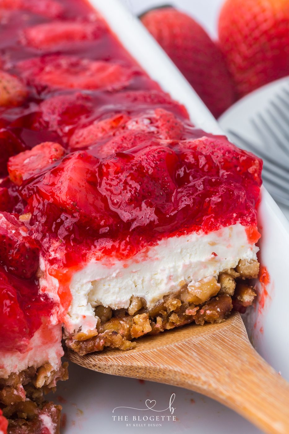Strawberry Pretzel Salad recipe! Pretzel crust with a creamy layer of cream cheese and whipped topping, topped with Jello and strawberries!