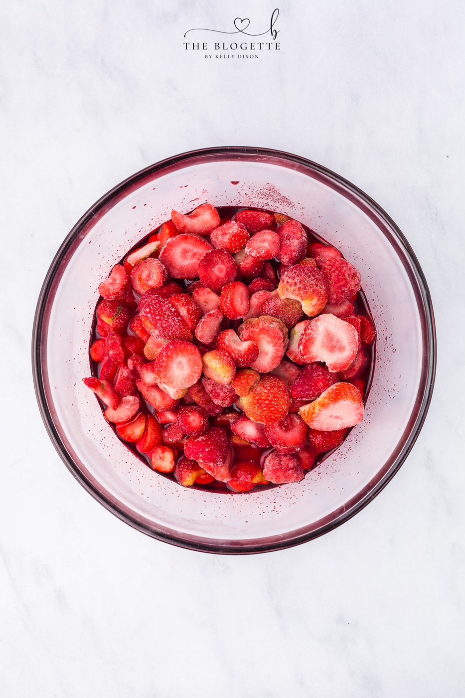 Make the Jello and add the strawberries