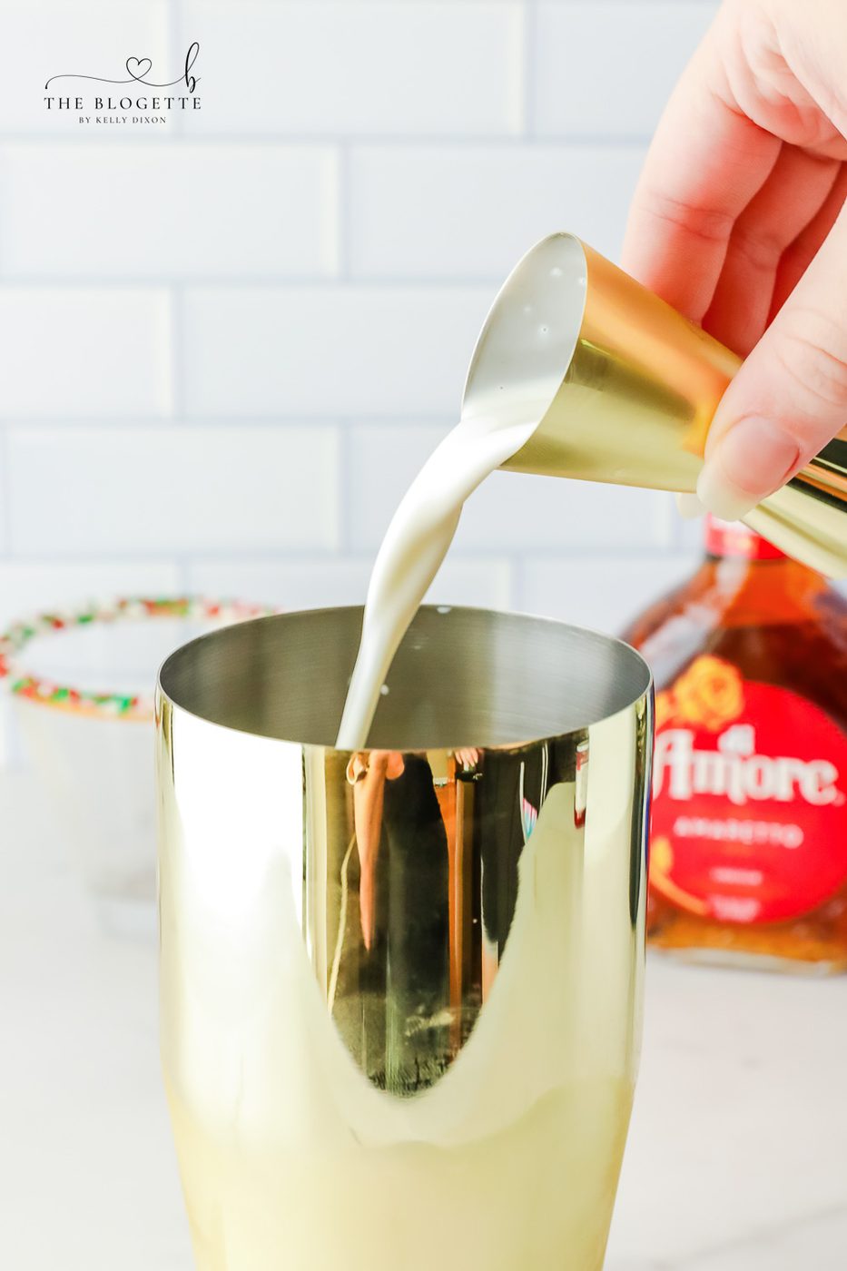 Adding alcohol to a martini shaker