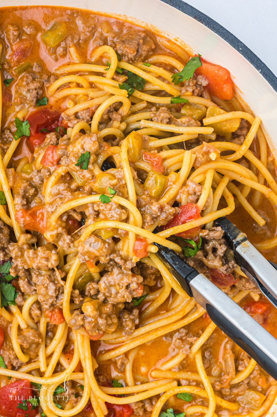 Straightforward One-Pot Taco Spaghetti (Cheesy Tex-Mex Pasta). Fast and flavorful - all our favorite taco flavors with classic comfort food spaghetti.