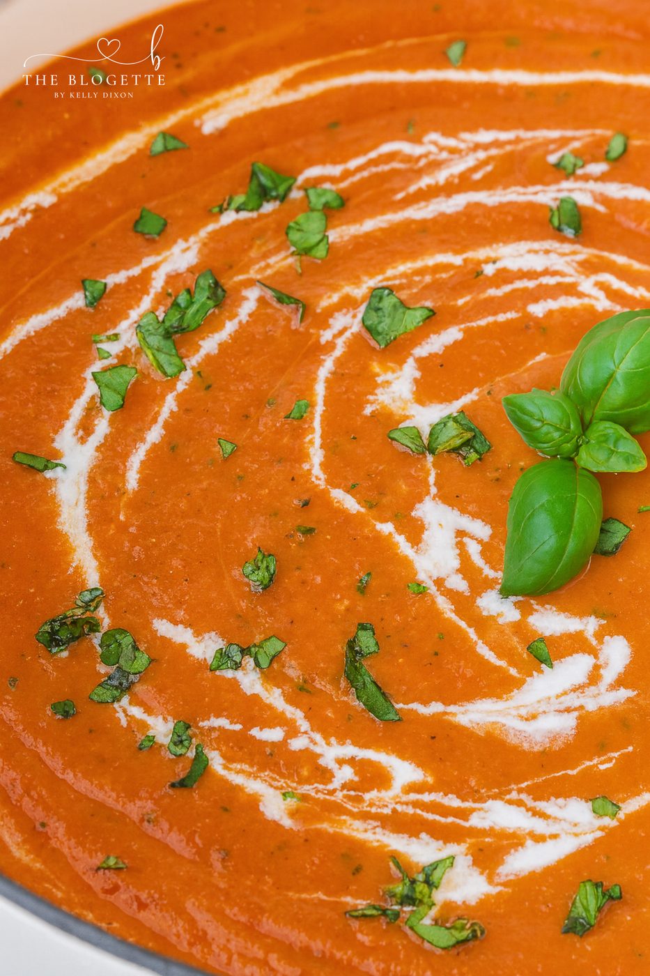 Creamy Tomato Bisque Soup made with fire-roasted tomatoes, roasted red peppers, sun-dried tomatoes, and Parmesan. Smooth, rich, and well-balanced with grilled cheese!