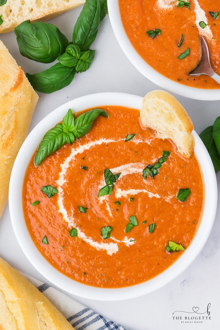 Creamy Tomato Bisque Soup made with fire-roasted tomatoes, roasted red peppers, sun-dried tomatoes, and Parmesan. Smooth, rich, and well-balanced with grilled cheese!
