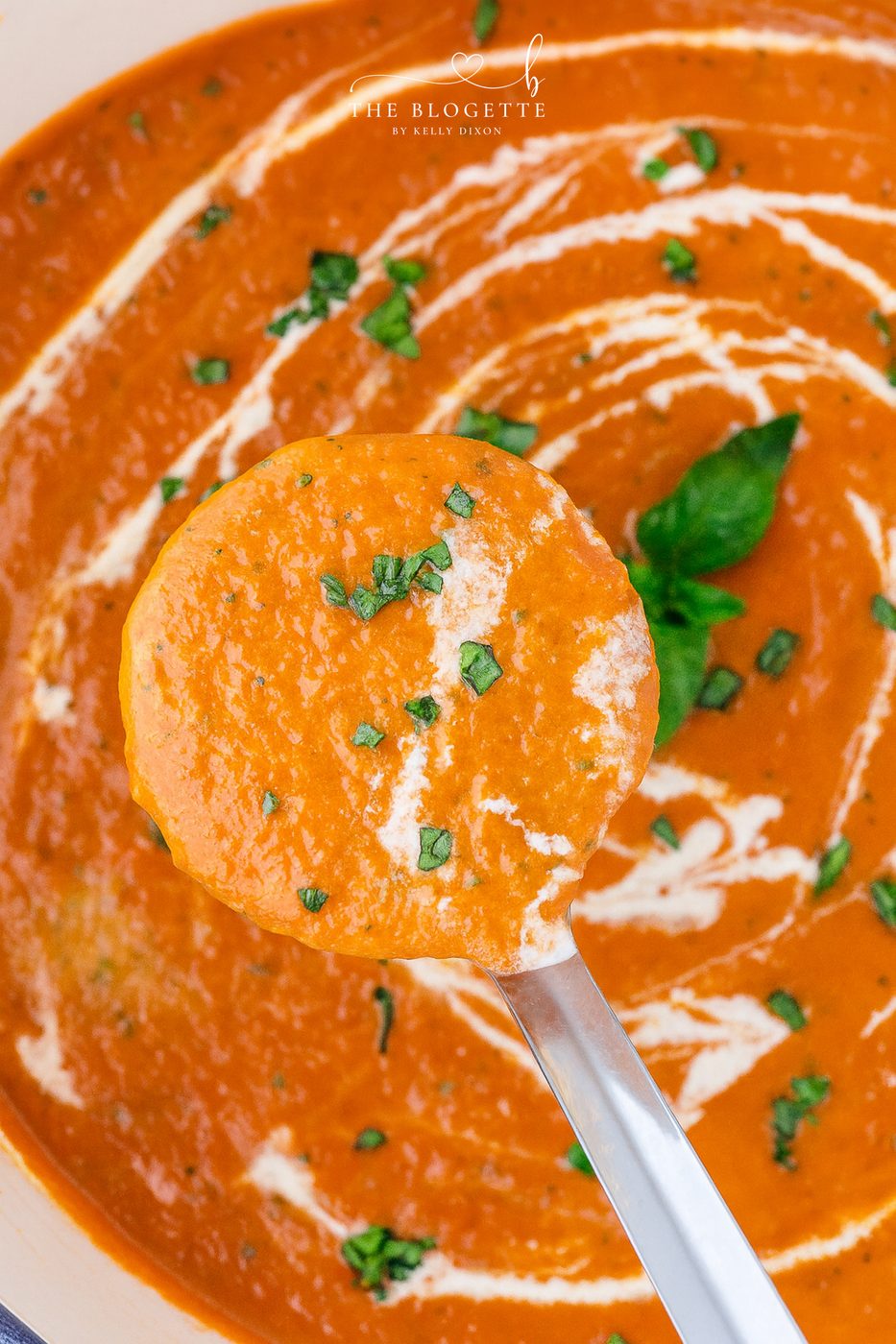 Creamy Tomato Bisque Soup made with fire-roasted tomatoes, roasted red peppers, sun-dried tomatoes, and Parmesan. Smooth, rich, and well-balanced with grilled cheese!
