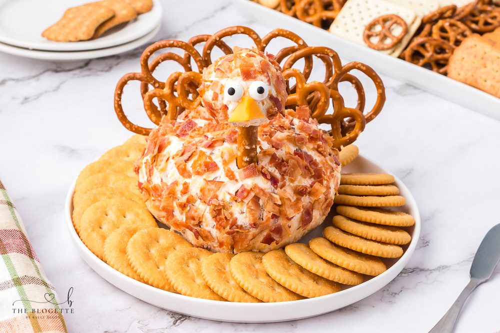 This Bacon Ranch Turkey Cheeseball will be a hit at the holiday table! This is a Thanksgiving appetizer you MUST add to your menu!