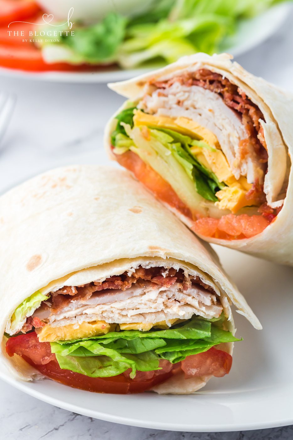 This straightforward Turkey Ranch Club Wrap is just what your lunch hour needs! Turkey, bacon, and cheese, drizzled with ranch dressing!