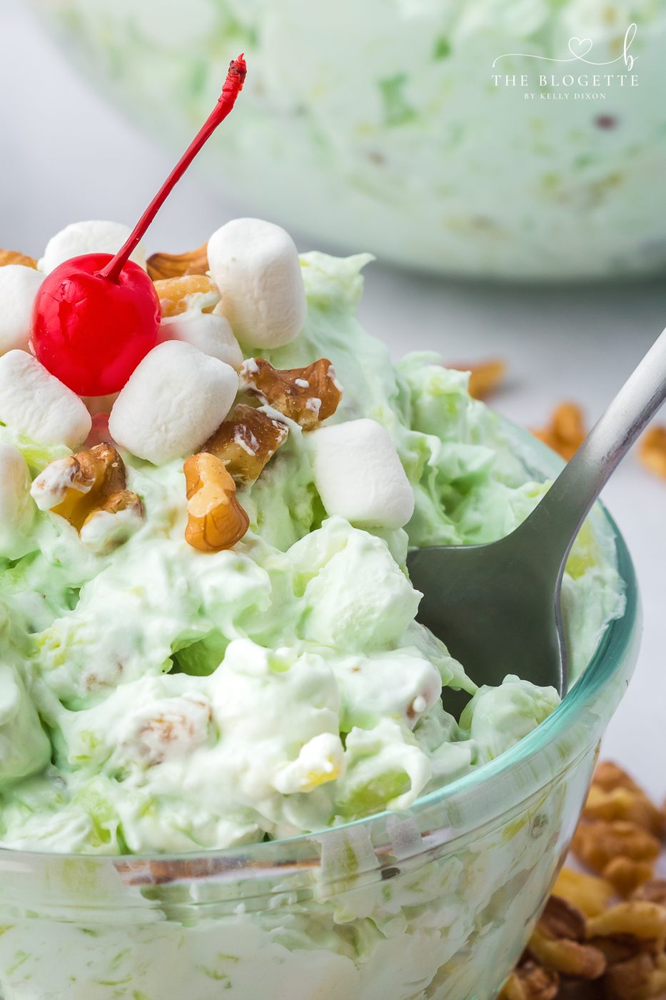 Watergate salad is a light and fluffy dessert salad. With pistachio pudding, juicy fruit and creamy whipped topping. Its creamy and fruity!