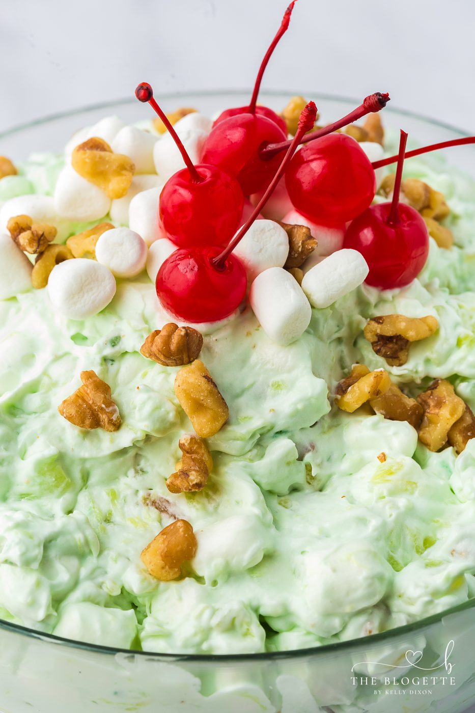 Watergate salad is a light and fluffy dessert salad. With pistachio pudding, juicy fruit and creamy whipped topping. Its creamy and fruity!