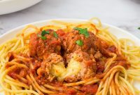 Slow Cooker Cheesy Stuffed Meatball Magic