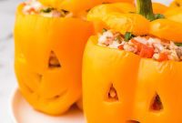 Spooktacular Jack O Lantern Stuffed Peppers