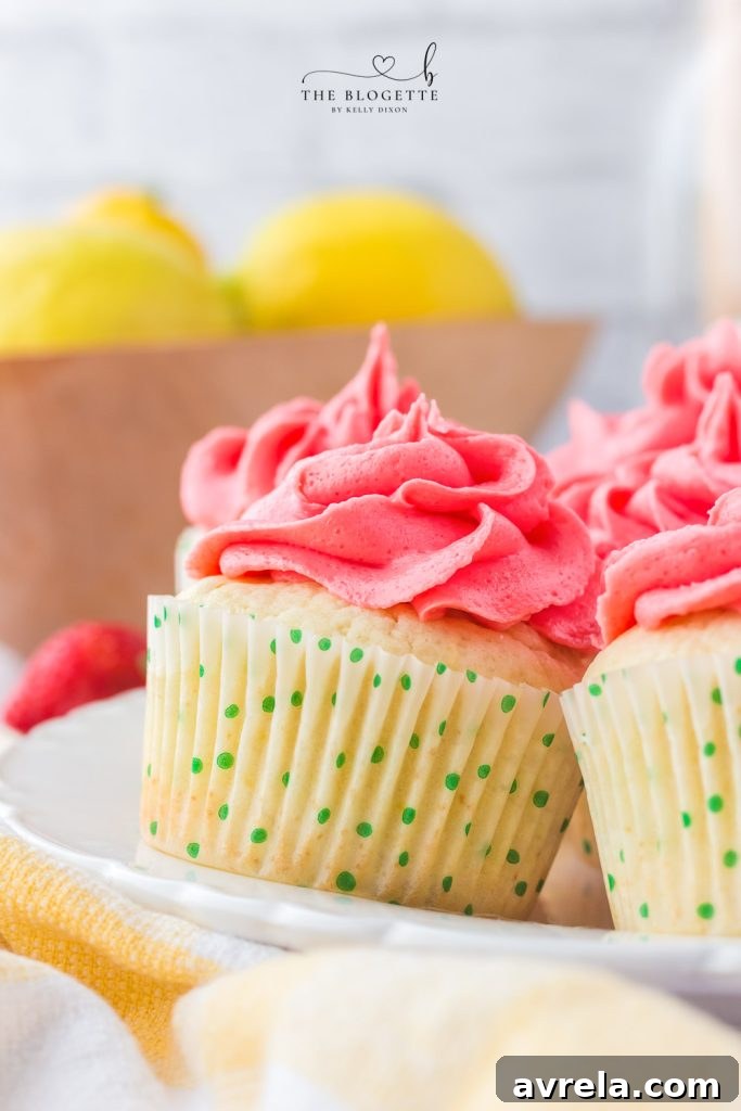 A delicious Strawberry Lemon Cupcake ready to be enjoyed.