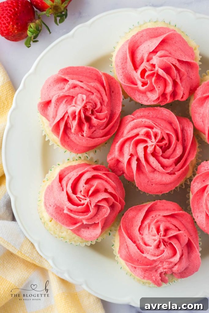 Ingredients for strawberry Jello frosting, including Jell-O powder, powdered sugar, butter, and milk.