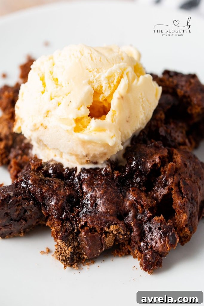 Close-up of a Hot Fudge Pudding Cake showing the molten fudge sauce underneath the chocolate cake